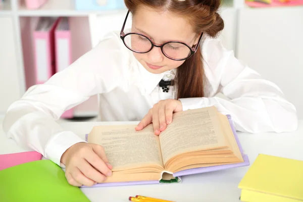 Cute girl at workplace in classroom — Stock Photo, Image