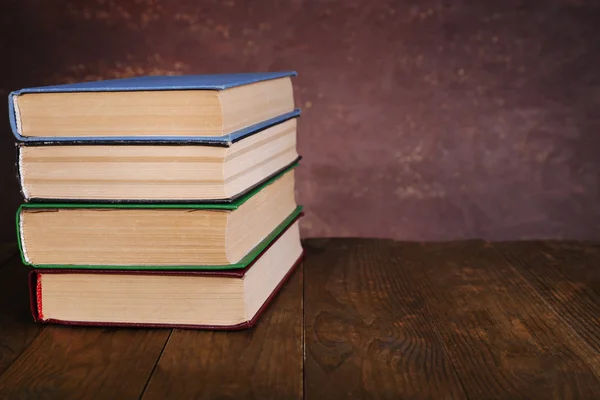 Books on wooden table — Stock Photo, Image