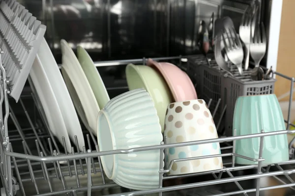 Open dishwasher with utensils — Stock Photo, Image