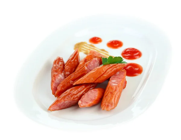 Smoked thin sausages and vegetables on plate, isolated on white — Stock Photo, Image