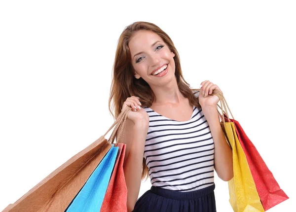 Beautiful young woman with shopping bags isolated on white — Stock Photo, Image