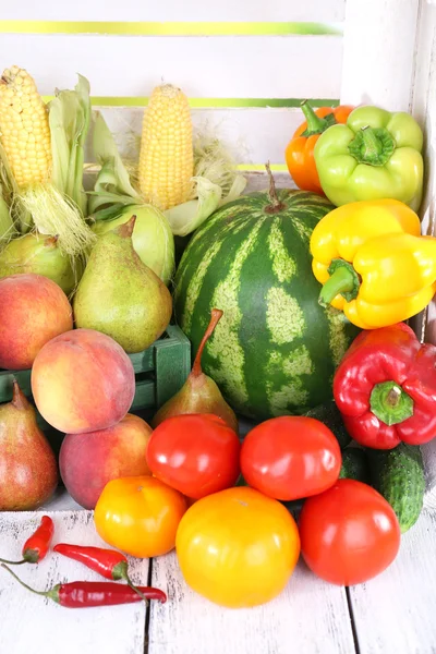 Vegetables on wooden table on white wooden box background — Stock Photo, Image