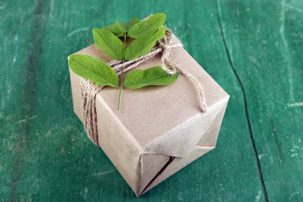 Gift box with fresh flowers — Stock Photo, Image