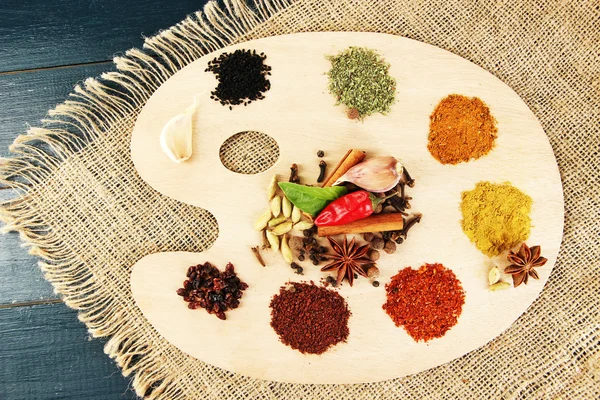 Palette with various spices and herbs — Stock Photo, Image