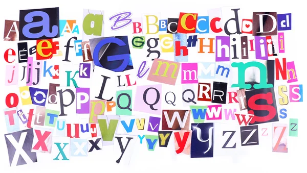 Colorful newspaper alphabet isolated on white — Stock Photo, Image