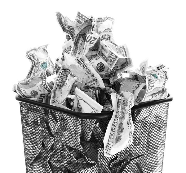 Money in dustbin isolated on white — Stock Photo, Image