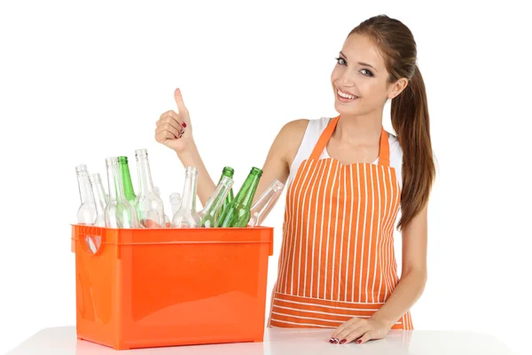 Young girl sorting glass bottles isolated on white Stock Image