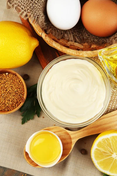 Mayonnaise ingredients on wooden background — Stock Photo, Image