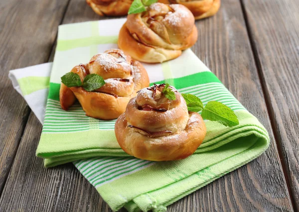 Tasty buns with berries on table close-up — Stock Photo, Image