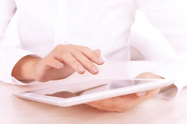 Woman using digital tablet Stock Image