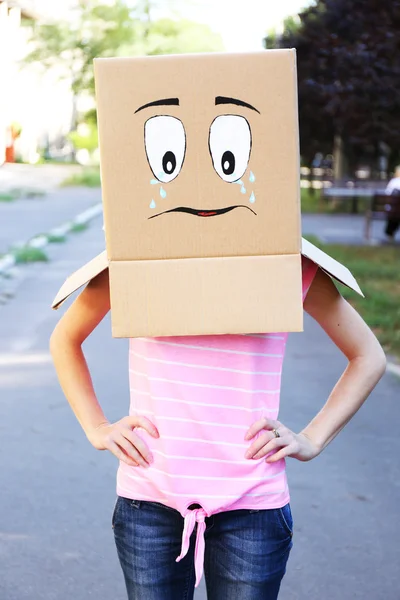 Woman with cardboard box — Stock Photo, Image