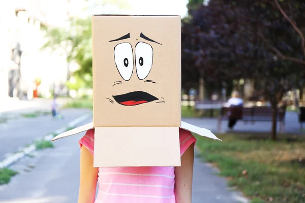 Woman with cardboard box — Stock Photo, Image