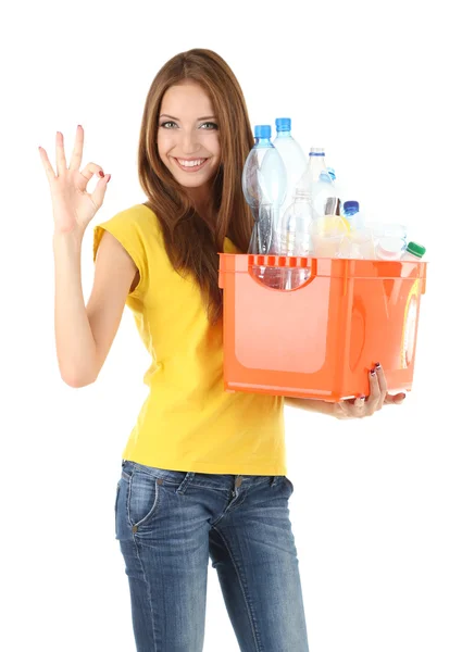 Fiatal lány, elszigetelt fehér műanyag palackok válogatás — Stock Fotó