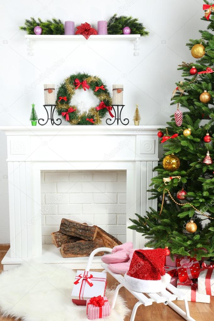 Fireplace With Beautiful Christmas Decorations In Room Stock