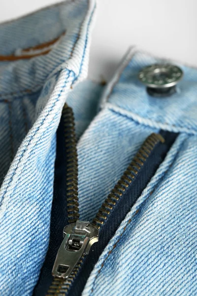 Zipper and button on clothes close up — Stock Photo, Image