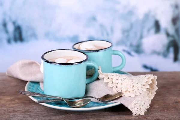 Cups of tasty hot cocoa — Stock Photo, Image