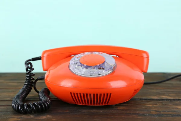 Old red disk phone — Stock Photo, Image