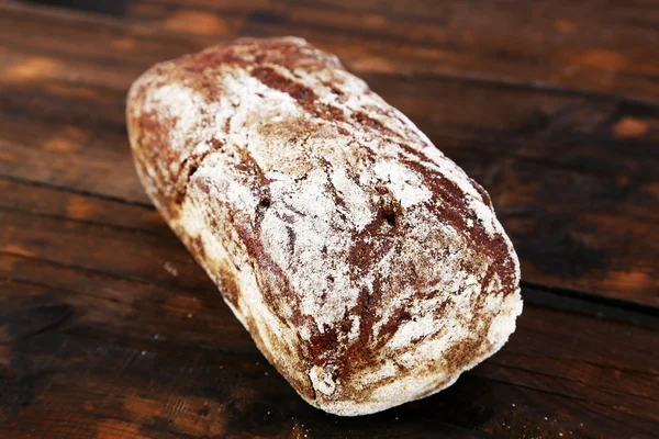 Rye bread on wooden background — Stock Photo, Image