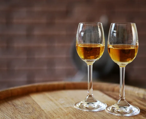 Glasses of wine in cellar — Stock Photo, Image