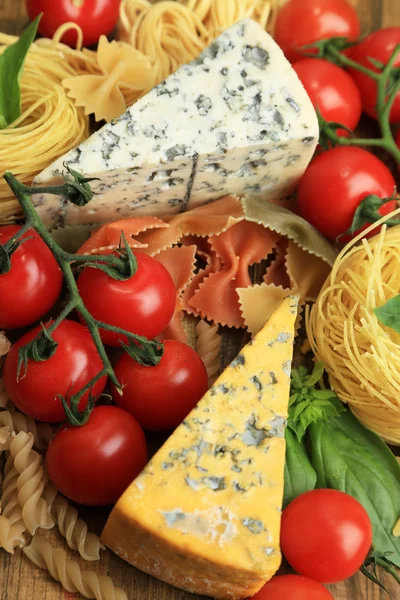 Pasta, cheese and tomatoes close-up — Stock Photo, Image
