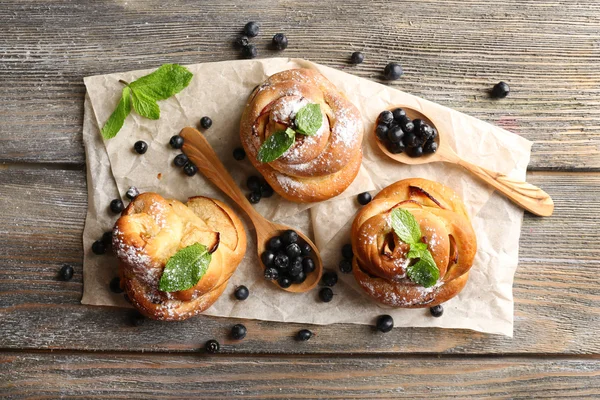 Tasty buns with berries — Stock Photo, Image