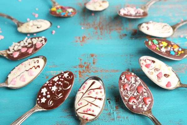 Spoons with tasty chocolate — Stock Photo, Image