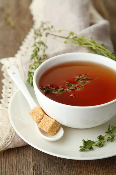 Cup of tasty herbal tea — Stock Photo, Image