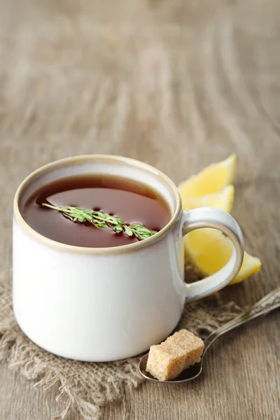 Cup of tasty herbal tea — Stock Photo, Image
