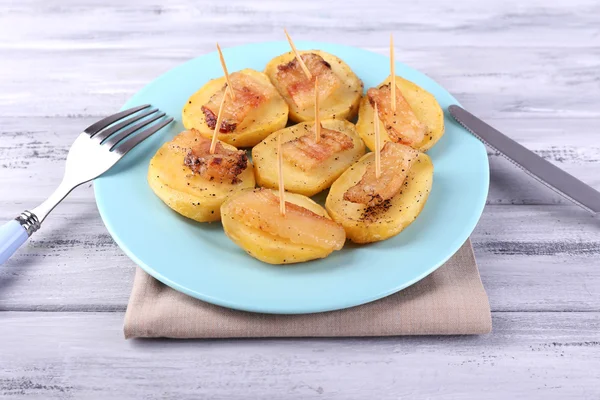 Baked potato with bacon — Stock Photo, Image