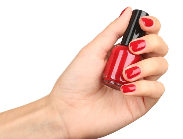 Nail polish in hand, close-up — Stock Photo, Image