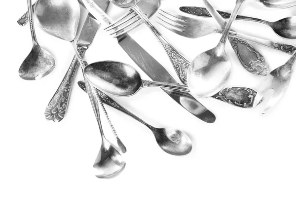 Disordered tableware isolated on white — Stock Photo, Image