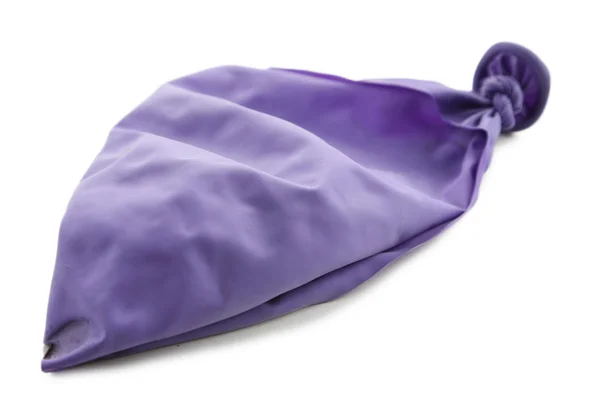 Popped violet balloon — Stock Photo, Image