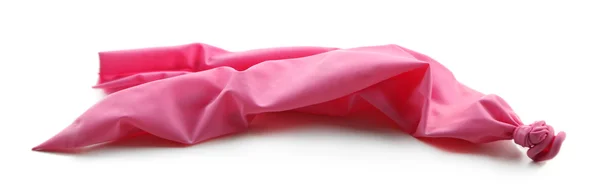Popped pink balloon — Stock Photo, Image