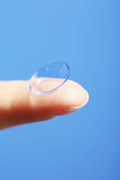 Contact lens on finger — Stock Photo, Image