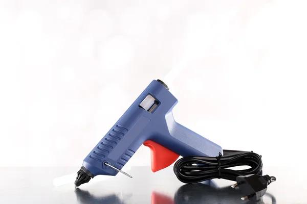 Dark blue glue gun — Stock Photo, Image