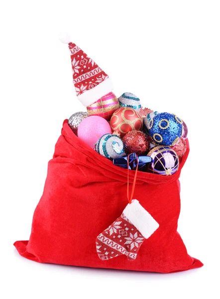 Rote Tüte mit Weihnachtsspielzeug — Stockfoto