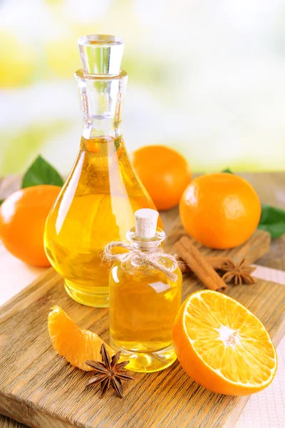 Tangerine oil on table — Stock Photo, Image