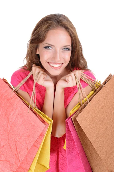 Beautiful young woman with shopping bags isolated on white Stock Image