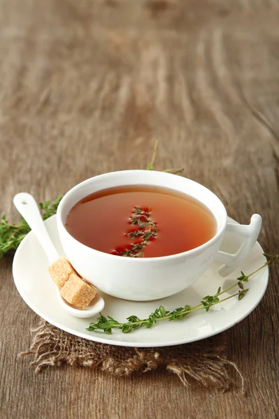 Cup of tasty herbal tea — Stock Photo, Image