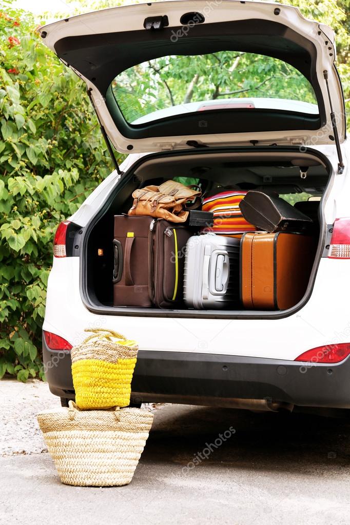 Suitcases and bags in trunk 