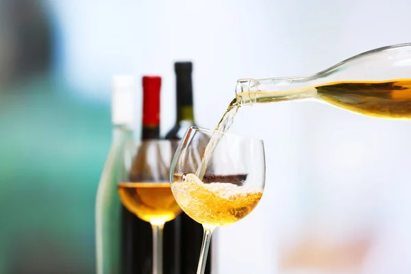 Wine pouring into wine glass — Stock Photo, Image