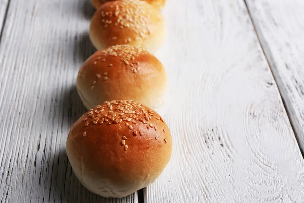 Tasty buns with sesame — Stock Photo, Image