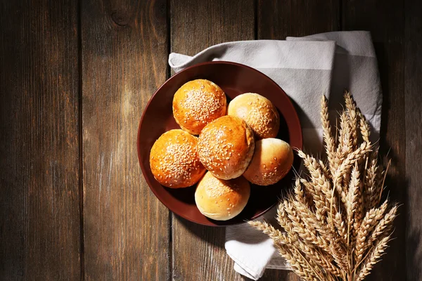 Tasty buns with sesame — Stock Photo, Image