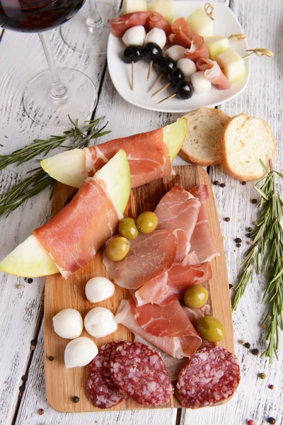 Delicious melon with prosciutto — Stock Photo, Image