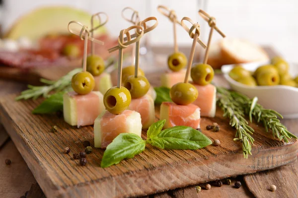 Delicious melon with prosciutto — Stock Photo, Image