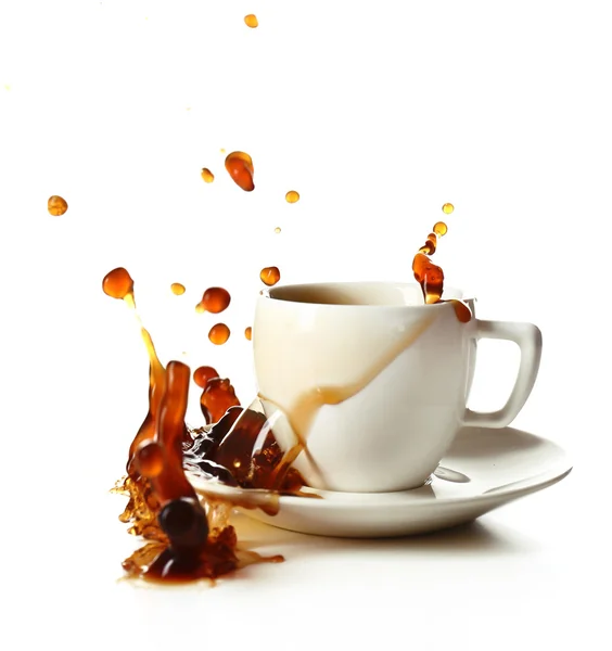 Cup of coffee with splashes, isolated on white — Stock Photo, Image