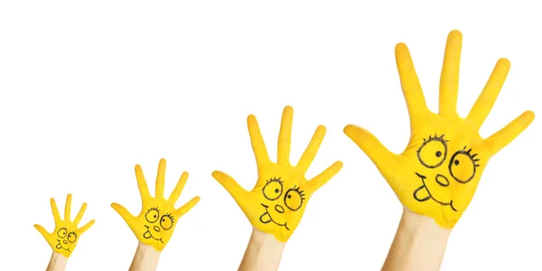 Painted yellow hands — Stock Photo, Image