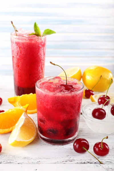 Fresh cold cherry cocktail with mint and lemon — Stock Photo, Image