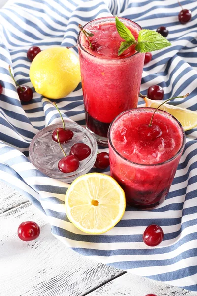 Fresh cold cherry cocktail with mint and lemon — Stock Photo, Image