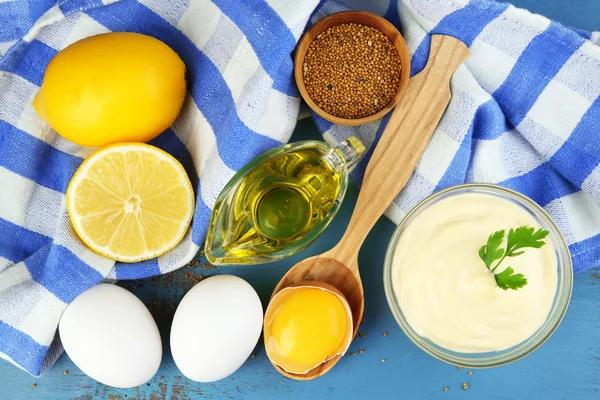 Mayonnaise ingredients on wooden background — Stock Photo, Image